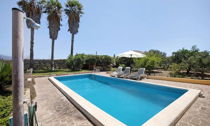 Guimar Appartement | Maison de vacances "Las Tres Palmeras" avec vue sur les montagnes, piscine partagée et Wi-Fi