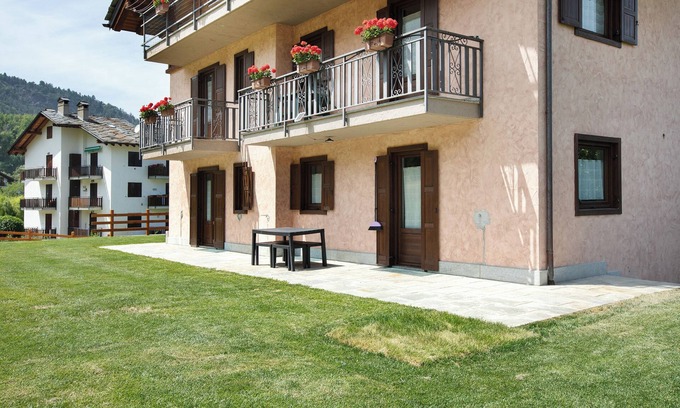 Plan D'introd Maison | Maison de vacances 'Le Cré Appartamento 2' avec vue sur la montagne, jardin partagé et Wi-Fi