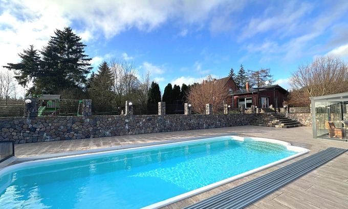 Dolgen am See Maison | Holiday Home MILA with Pool, Sauna, and Large Private Grounds