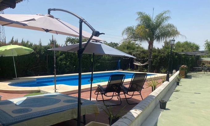 Dos Hermanas Chalet De Ski | Holiday house with shared pool in Sevilla