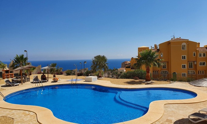 Pueblo Mascarat Appartement | Holiday Jazmines Appartement avec piscine et vue mer
