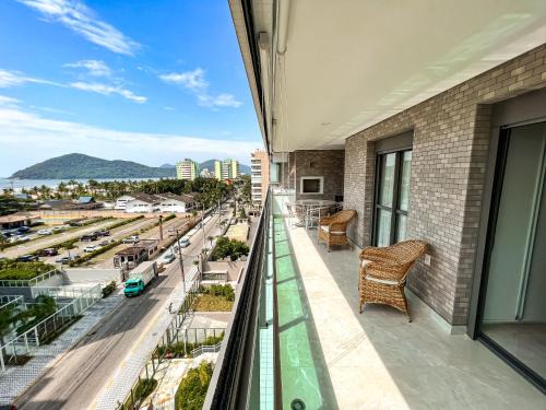Vila Clais Maison | Home 48 I Apto pé na areia e com Piscina Aquecida em Bertioga