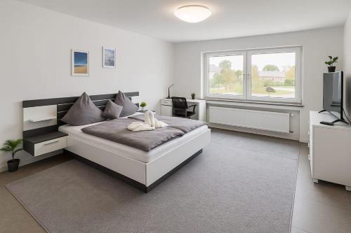 Huenfeld Appartement | Homefeld Moderne & ruhige Ferienwohnung in Hünfeld Nähe Bahnhof, mit Smart Tv & Parkplatz