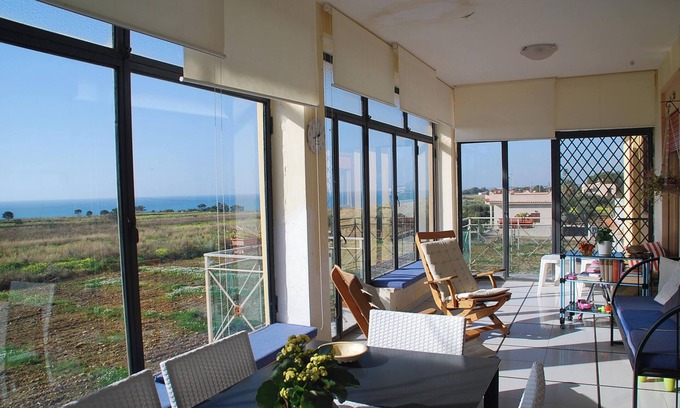 Porto Palo Appartement | Homerez - Appartement Porto Palo avec vue mer