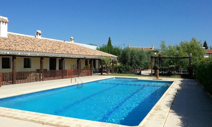 Caravaca de la Cruz Appartement | Homerez - Appartement pour 4 pers. avec piscine partagée et jacuzzi à Noguericas