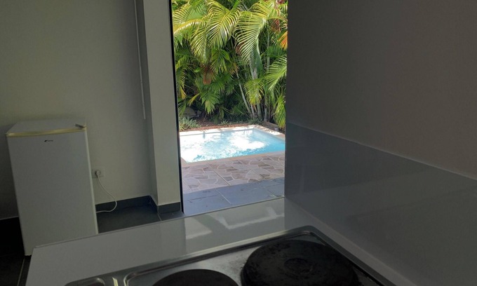 L'Autre-Bord Appartement | Homerez - Apt. in Le Moule, pool view