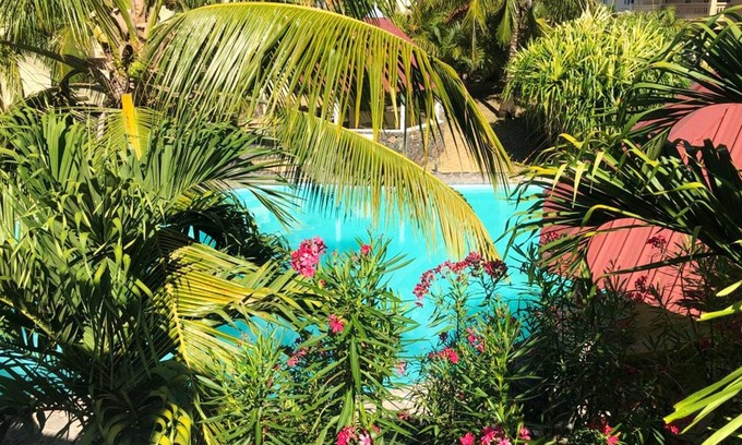 Palmar Maison | Homerez - Bungalow pour 6 pers. avec piscine partagée et vue sur la mer à Palmar