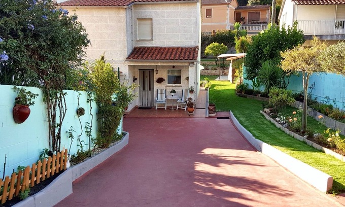 Eiras Maison | Homerez - Maison charmante à O Rosal avec jardin et spa