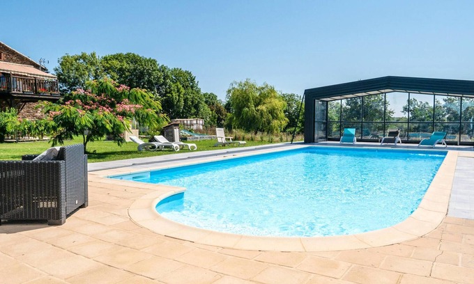 Andouque Maison | Homerez - Maison pour 6 pers. avec piscine partagée et terrasse à Andouque