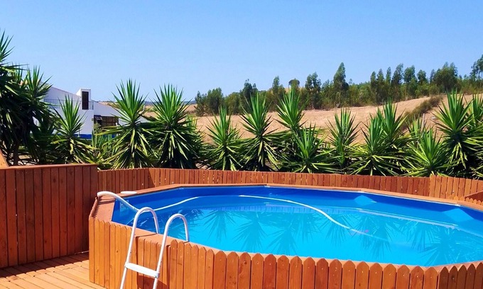 Luzianes Maison | Homerez - Maison pour 8 pers. avec piscine et terrasse à Santa Luzia