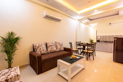 Vasundhara Appartement | Homlee-Vasundhara 3BHK Flat- kitchen-Parking-Lift