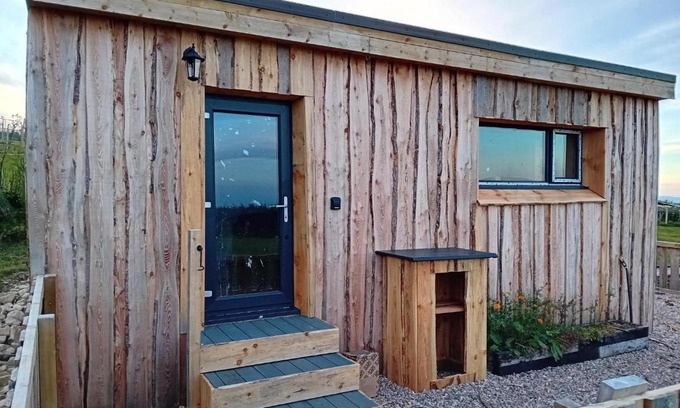 Forres Maison | Honeysuckle Straw Bale Cabin
