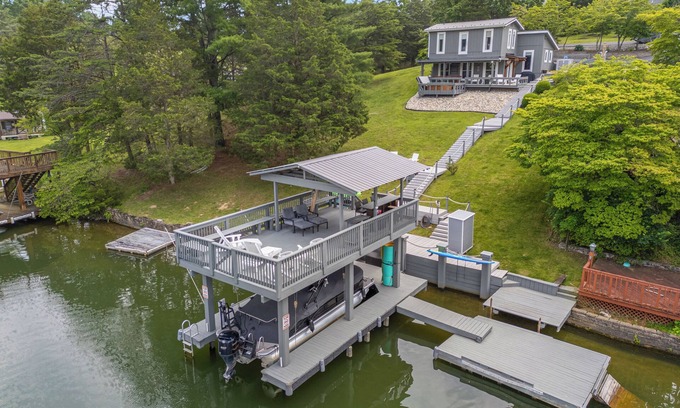 New River Maison | Hot tub, private dock, with water front lake access for relaxing or exploring.