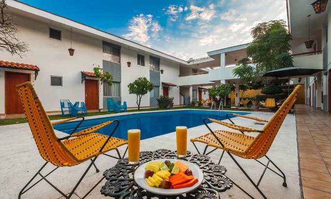 Americana Hôtel | Hotel Isabel