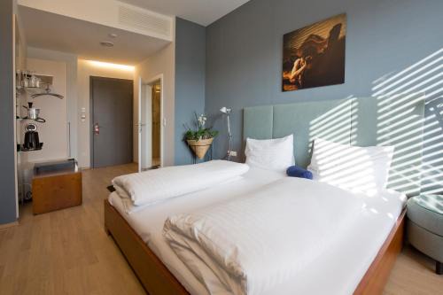 Feldbach Hôtel | Hotel Lava Inn - 24 h Check-In - Nähe LKH, Landeskrankenhaus, Feldbach
