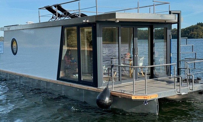 Dobin am See Location De Bateaux | Bateau-maison "Seahome" avec vue sur le lac, terrasse privée et Wi-Fi