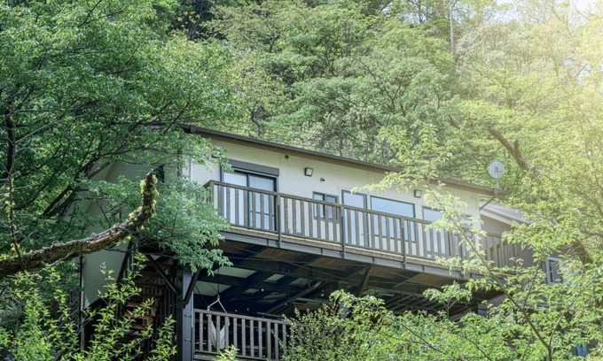 Shimotaga Maison | House with a large terrace and a natural hot spring rock bath / Atami Shizuoka