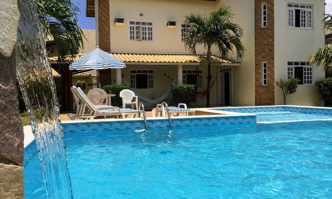 Flamengo Maison | Belle maison! Piscine, plage, jardin dans une communauté fermée!
