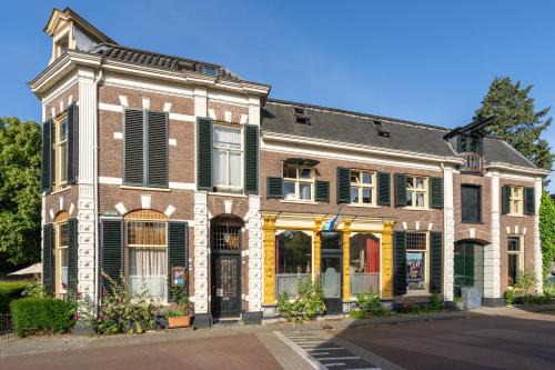 Dieren Appartement | Huis met de Leeuwenkoppen