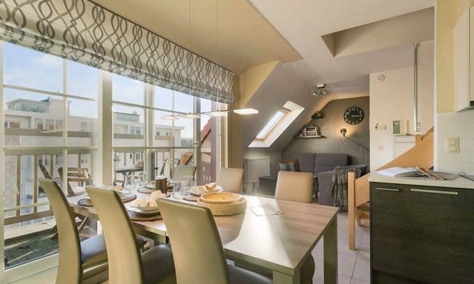 Westende Appartement | Huswell - Sunny duplex apartment near the beach