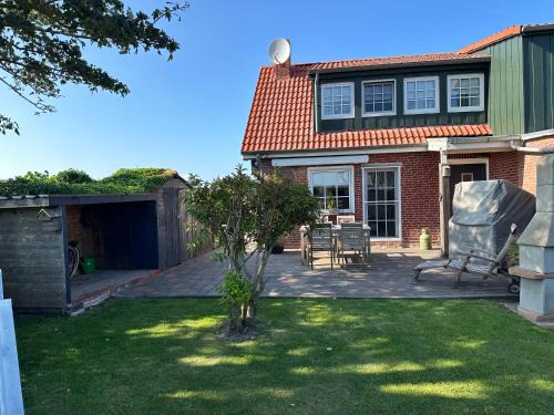 Ostermarsch Maison | "Huus ant Diek", Ferienhaus mit Maisonette Wohnung in Deichnähe, Nähe Norddeich