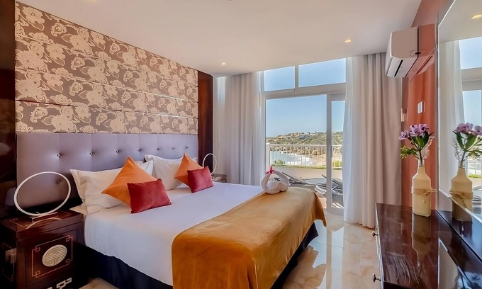 Oura Hôtel | Ideal Mix of Comfort & Value! Four Family Suites, Kitchenettes, Private Balcony!