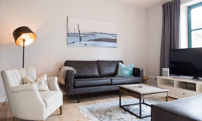 Dornum Appartement | "Idyllic vacation apartment in Neßmersiel - your retreat on the coast!"