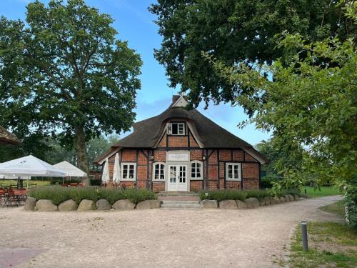 Ploen Appartement | Idyllischer Erholungsurlaub im Historischen Bauernhaus auf der Prinzeninsel Plön