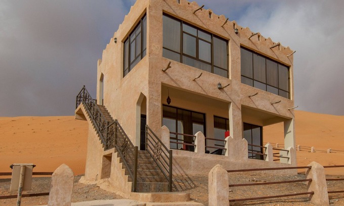 Bidiya Station Balnéaire | Immerse in ultimate desert elegance with the Sand Suite at Thousand Nights Camp