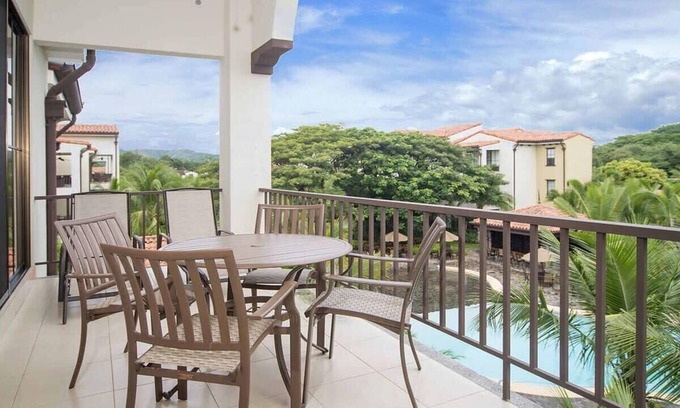 Coco Copropriété | Impressively designed and decorated 3rd-floor space overlooking pool in Coco