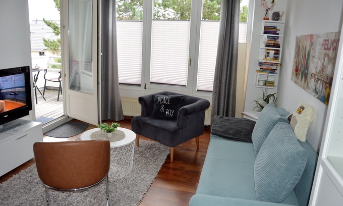 Niendorf Appartement | En peignoir à la plage ....