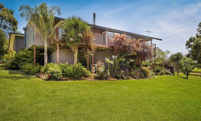 Rhyll Maison | Incredible 5 bedroom home in picturesque gardens with water views and free WIFI