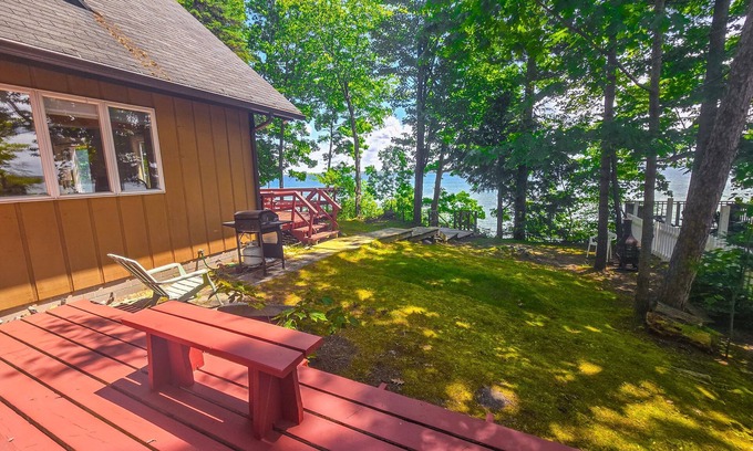 Indian River Maison | Incredible lakefront retreat with dock, fire pit, decks, yard, & amazing views