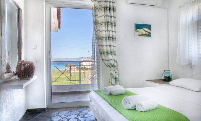 Velon Appartement | Condo indépendant, avec vue imprenable à quelques pas de la plage