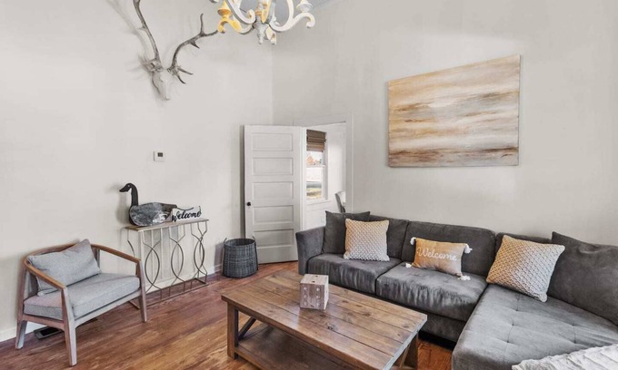 Mooringsport Maison | Southern Magnolia House with porch swing and rocking chairs