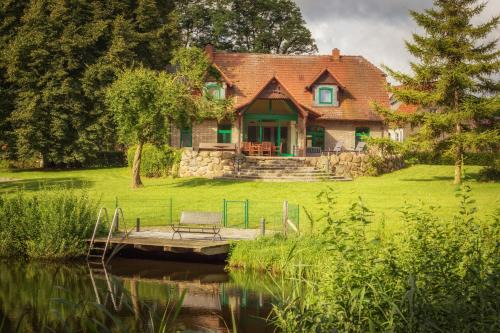 Julchendorf Maison | J1 Idyllisches Ferienhaus mit Seeblick