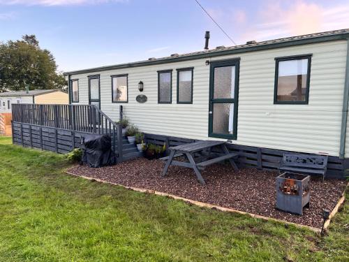 Balminnoch Station Balnéaire | Jungle House no.26 at Three Lochs Holiday Park