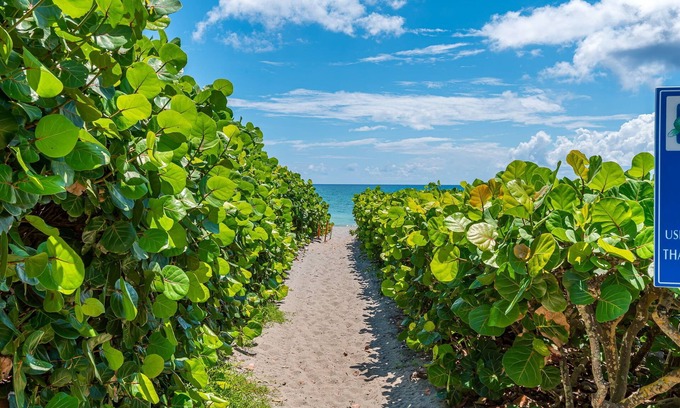 Juno Beach Copropriété | Juno Beach Landings 2 | Local Gem on the Beach!