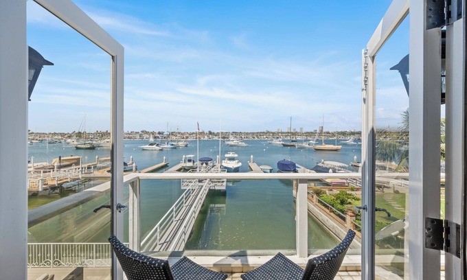 Balboa Peninsula Maison | Just Renovated Bay Facing Coastal Home with a Dock