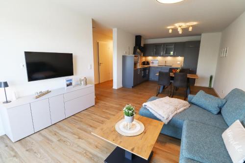 Tossens Appartement | KÜSTE33/20 – Exklusive Ferienwohnung mit Sauna & nah am Strand!