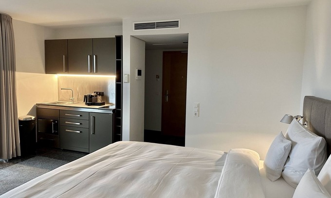 Unterrath Hôtel | King-de Luxe-Apartment-Salle de bain et douche-Balcon