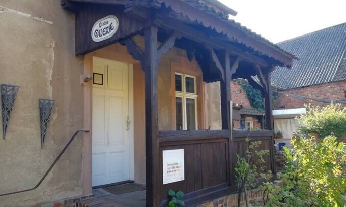 Steinhoefel Appartement | Kleine Galerie: Küche Kamin Netflix Hofladen