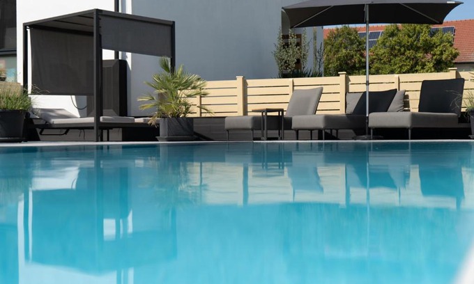 Illmitz Hôtel | Kracher Hotel Doppelzimmer - für maximal 4 Personen inklusive Pool