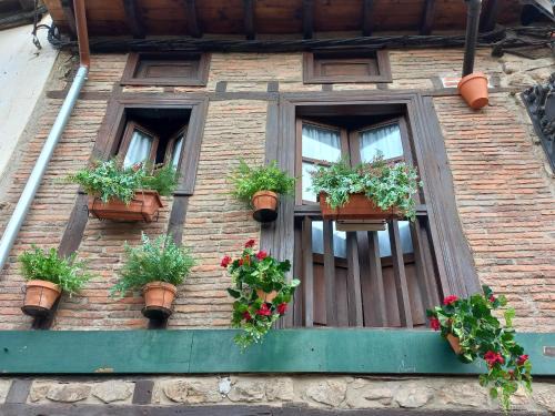 Potes Maison | La casuca del sol
