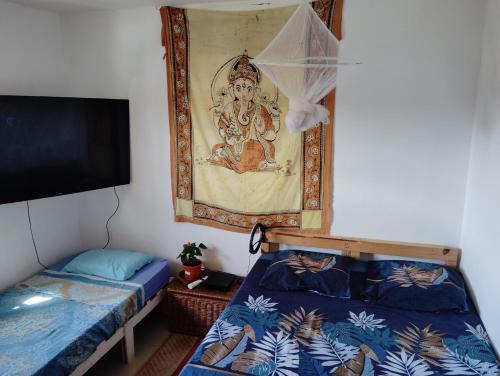 Saint-Andre Maison | La chambre Ganesh