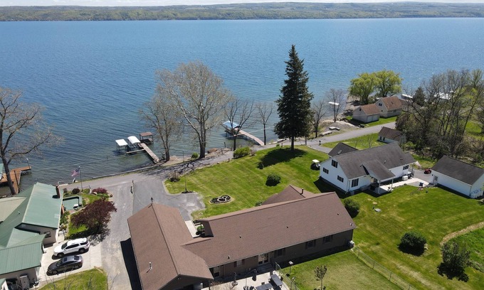 Himrod Maison | Lake front 8-bedroom house with movie theatre, hot tub, and game room!