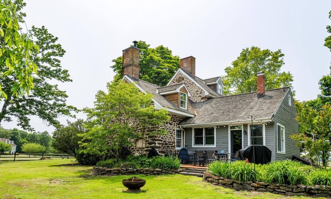 Quinton Autre | Lake front historic farmhouse on 5 acres, fenced and pet friendly!