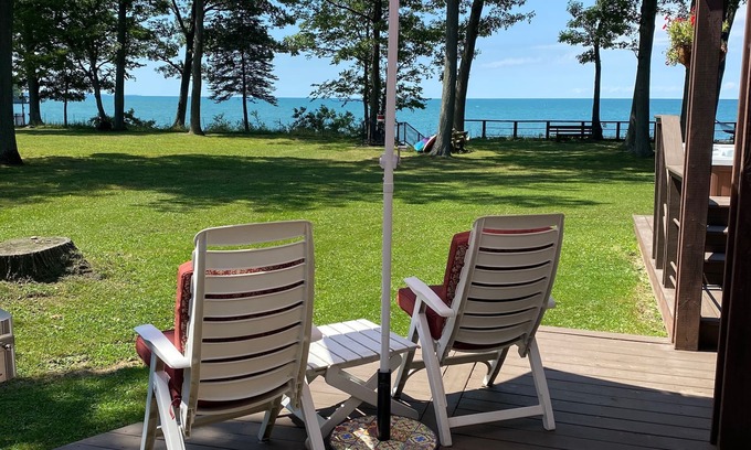 Irving Maison | Lake Front Home. Private stairs to private beach and bay. upscale 5 bedroom home