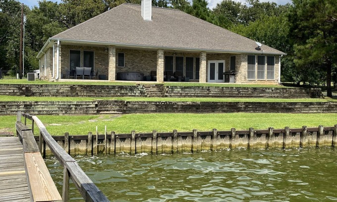 West Livingston Maison | Lake front property on 3 acres offering privacy and never ending views.