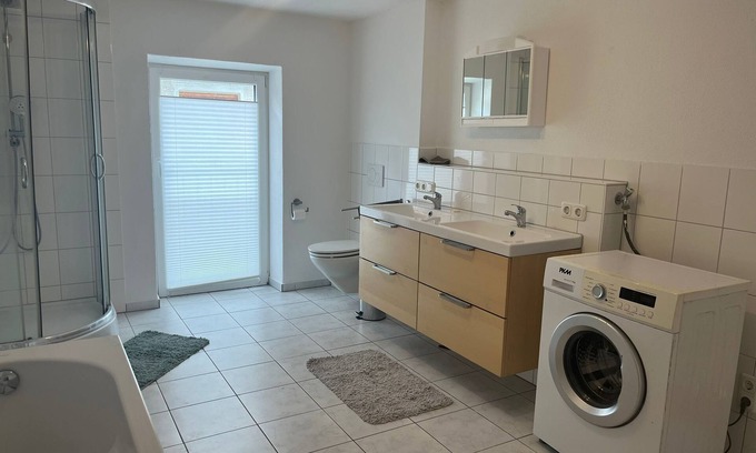 Ammerland Appartement | Lake Starnberg: Maisonette with wood-burning stoves, balcony, bathrooms
